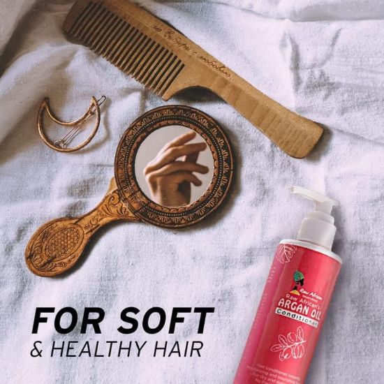 صورة بلسم بزيت الارجان من رو افريكان مرطب ومغذي للشعر الجاف والتالف خالي الكبريت والبارابين والالوان الصناعية ومضاد للتشعث يعزز نمو لشعر صحي ولامع 300 مل