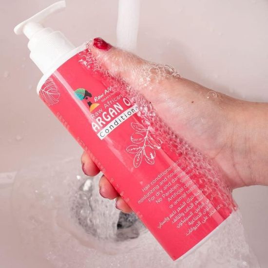 صورة بلسم بزيت الارجان من رو افريكان مرطب ومغذي للشعر الجاف والتالف خالي الكبريت والبارابين والالوان الصناعية ومضاد للتشعث يعزز نمو لشعر صحي ولامع 300 مل